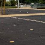 Délimitation de parking avec pastilles